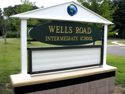 Monument sign for a local school. Double sided with 3 line message board